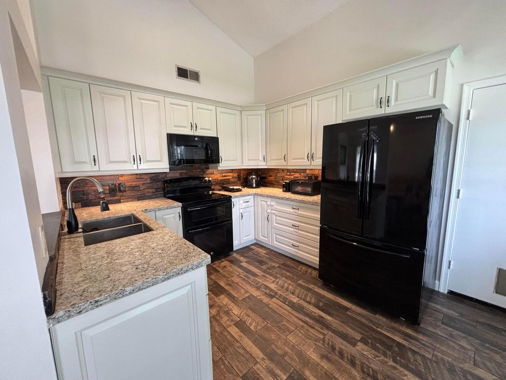 Photo of 5415 Courtney Circle, Boynton Beach, FL 33472 (MLS # B26020807)