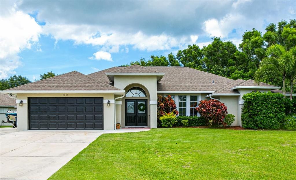 Photo of 6800 NW Hogate Circle, Port Saint Lucie, FL 34983 (MLS # R10732777)