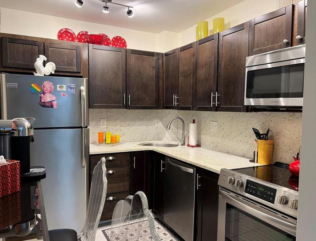 Photo of 1950 N Andrews Avenue #103d, Wilton Manors, FL 33311 (MLS # B26004445)