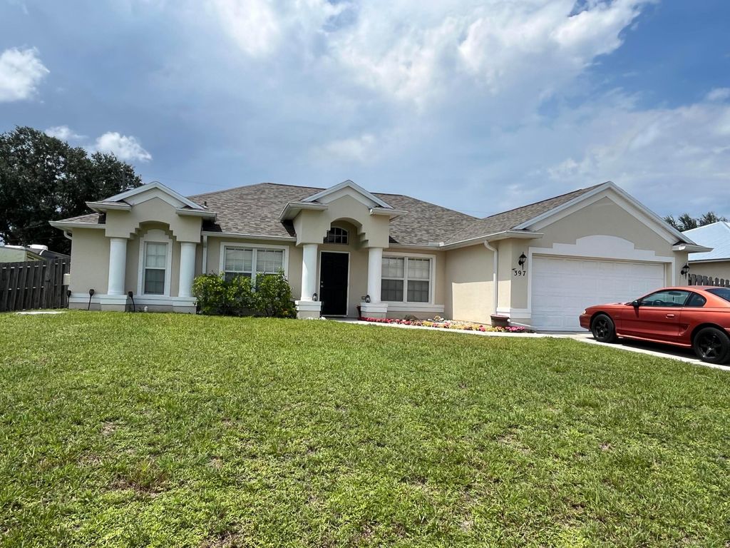 Photo of 397 SW Jeanne Avenue, Port Saint Lucie, FL 34953 (MLS # R11102419)