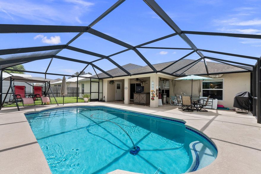 This spacious 4-bedroom, 2-bath home offers over 2200 sq ft under air and was thoughtfully designed for both comfort and entertaining. Built in 2006, it features large kitchen overlooking the family room, a separate dining room and a versatile den perfect for the home office or flex space. Step outside to your backyard oasis, complete with a screen enclosed saltwater swimming pool (2019), fully fenced yard, and storage shed. Inside, you'll find both style and durability. major updates include a new roof (2025) and AC (2020), giving you peace of mind for years to come. With generous living spaces and modern improvements, this home blends function, charm, and Florida lifestyle living.