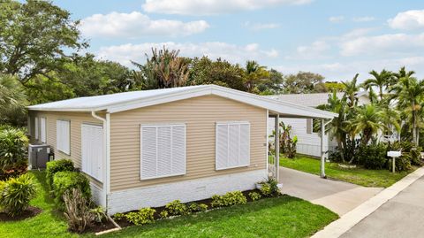 Photo of 400 N Hwy A1a, Jupiter, FL 33477 (MLS # B26010104)