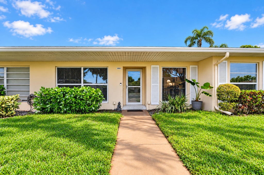 Photo of 8900 Warwick Drive, Boca Raton, FL 33433 (MLS # B26082448)