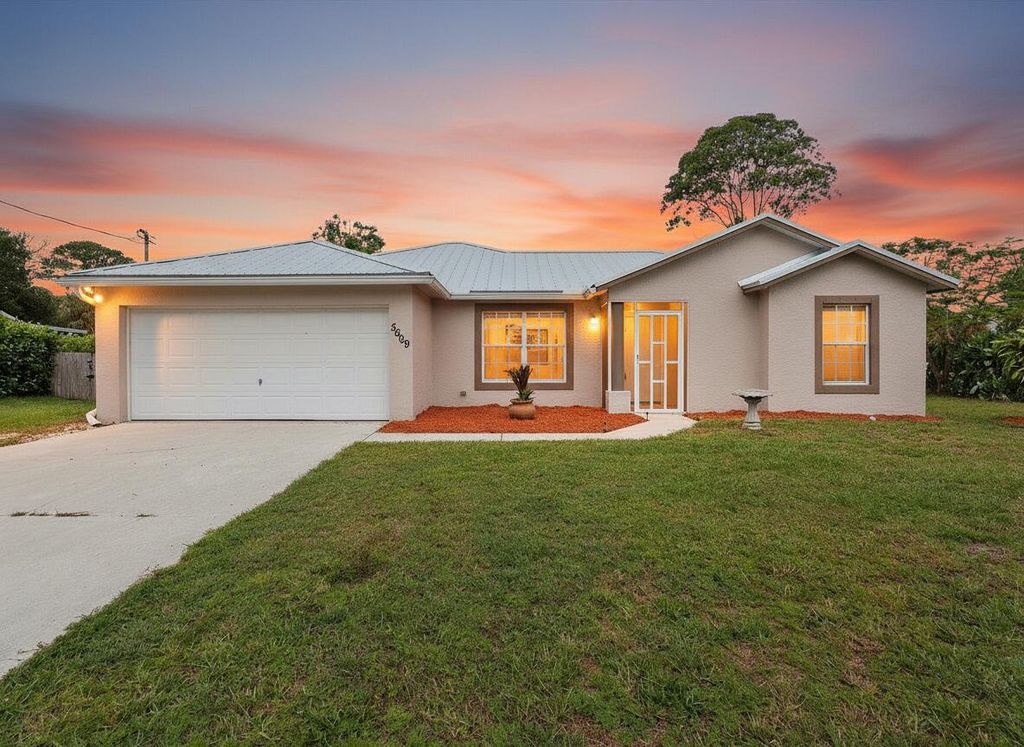 Photo of 5609 Sunset Boulevard, Fort Pierce, FL 34982 (MLS # R11093517)