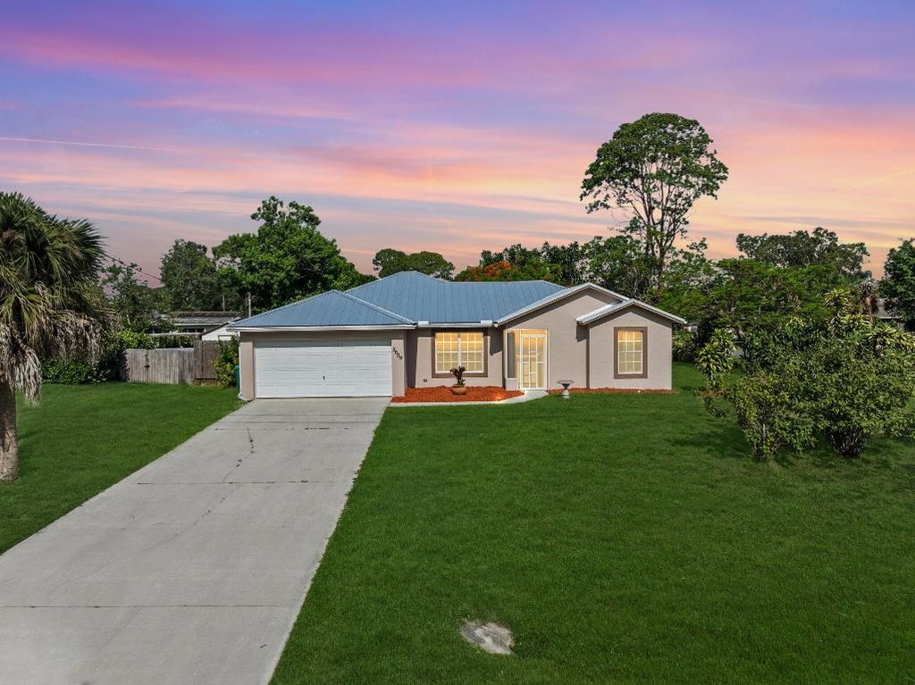 Photo of 5609 Sunset Boulevard, Fort Pierce, FL 34982 (MLS # R11093517)