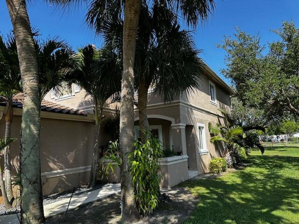 Photo of 4708 Pinemore Lane, Lake Worth, FL 33463 (MLS # R11091867)