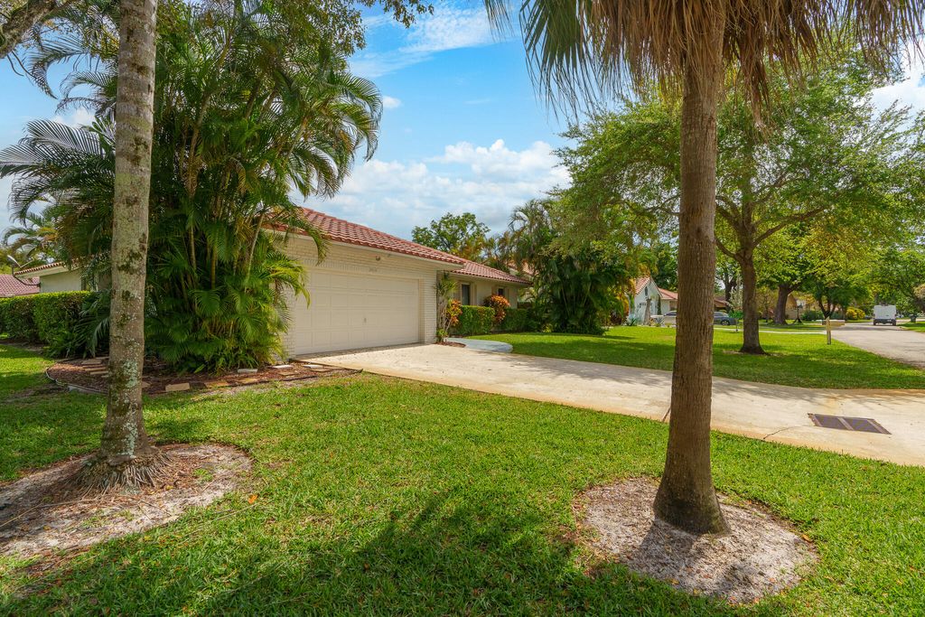 Photo of 3919 NW 72nd Drive, Coral Springs, FL 33065 (MLS # R10970288)