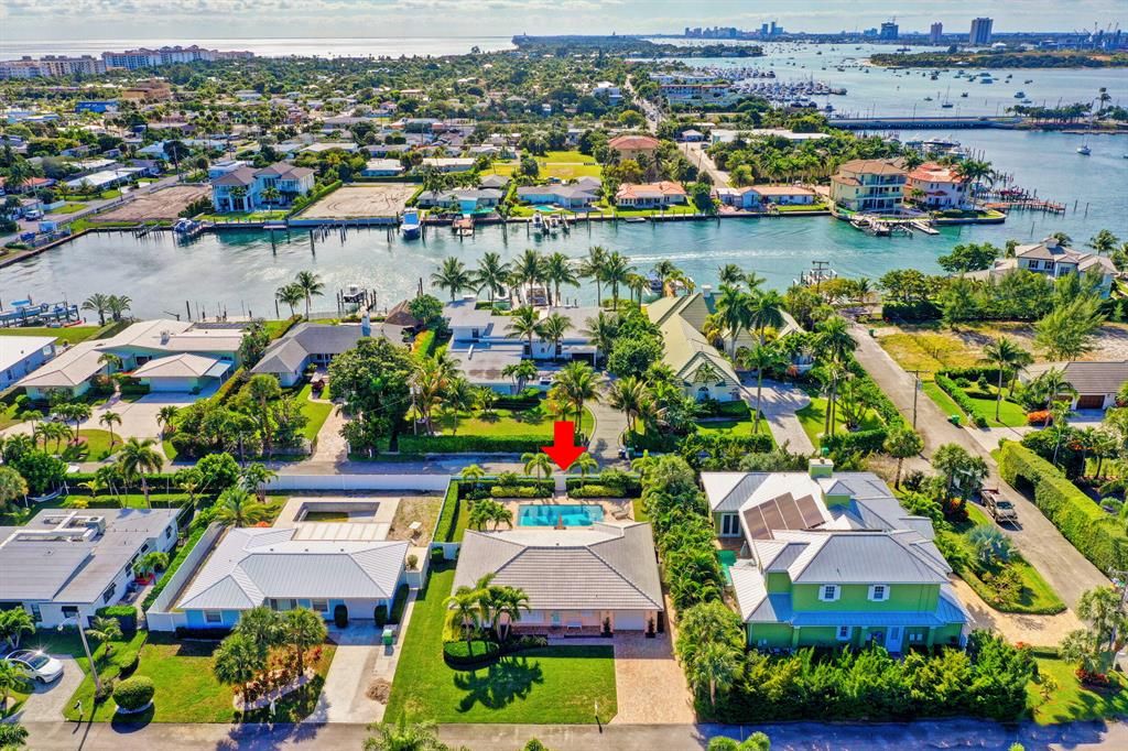 Photo of 1118 Surf Road, Riviera Beach, FL 33404 (MLS # R10771397)