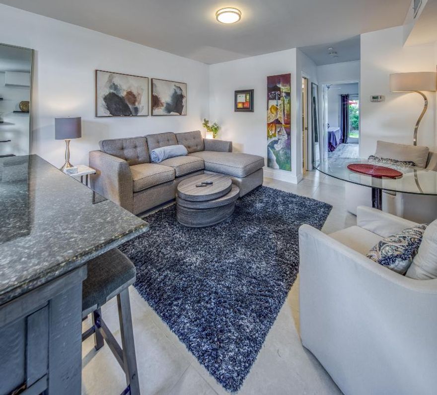 Beautiful and super private Lux 1/1, private tropical yard, turnkey, full range, ref, micro, W/D, Central A/C, east of Federal, central to everything