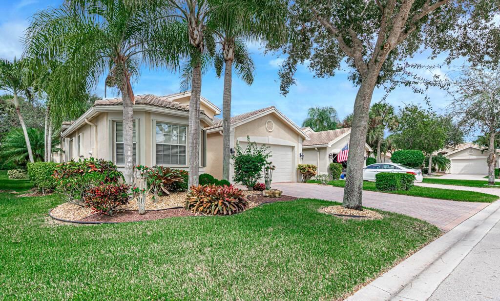 Photo of 9811 Chantilly Point Lane Ln, Lake Worth Beach, FL 33467 (MLS # R10749553)