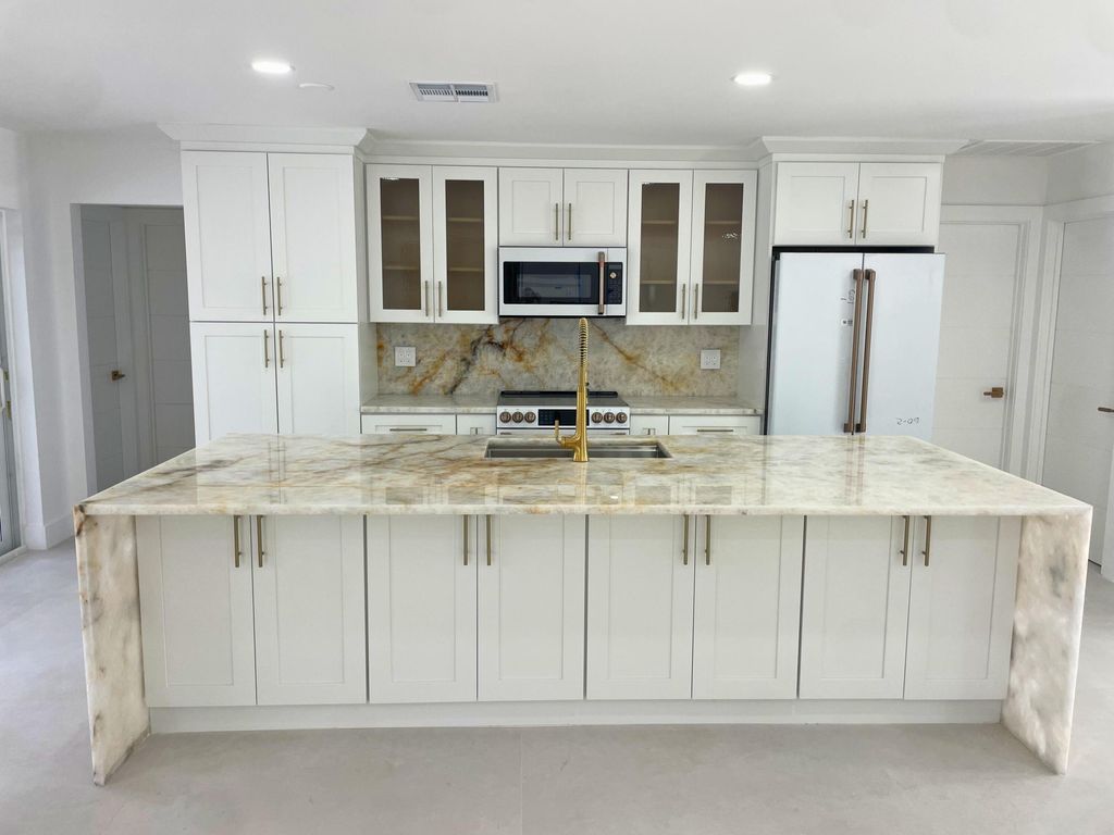 Photo of 359 Country Club Drive, Tequesta, FL 33469 (MLS # B26010959)