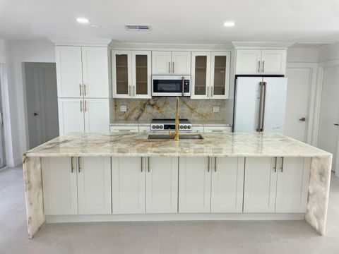 Photo of 359 Country Club Drive, Tequesta, FL 33469 (MLS # B26010959)