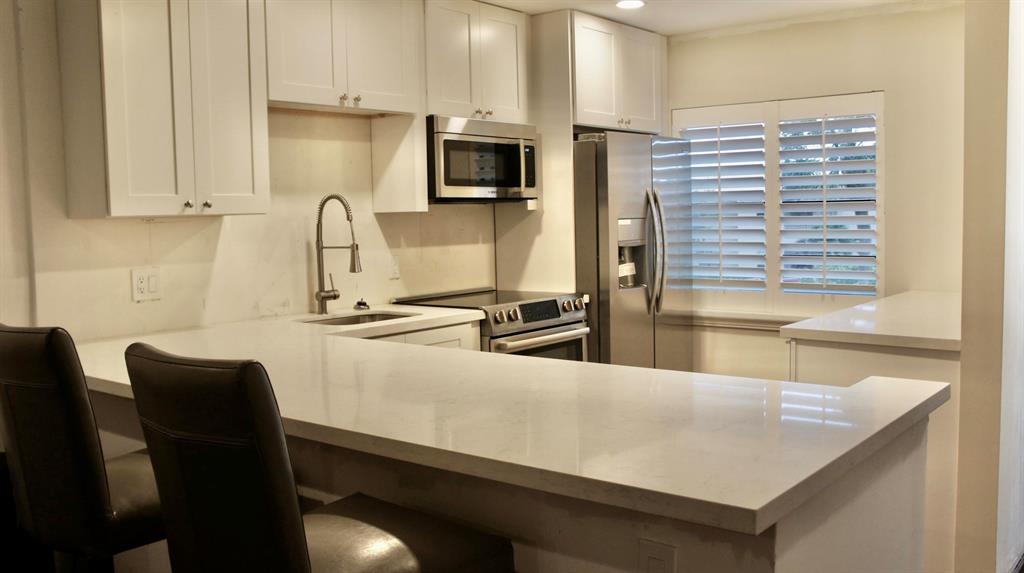 Come see this charming condominium with an open floor plan and breathtaking panoramic views of walk through park view in the back! This interesting second floor PARTIALLY REMODELED light bright exceptional 1,216.00 sqft condo nestled in the The Pines Of BOCA LAGO, freshly painted throughout, NO POP CORN CEILINGS, NO MIRRORS, ALL NEW BOSCH appliances ,2020 A/C and REEHM water heater, NEW electrical panel, and ALL NEW TWENTY ONE high hats throughout and RECEDED LIGHTING throughout. REMODELED kitchen with white shaker JARLIN CABINETRY quality kitchen cabinets w/self sliding enclosure, and high quality POMPAI quarts counter tops, NEW stainless steel chef sink. ituated in a friendly community with an award-winning school system on the outskirts of The Pines Of Boca Lago, just five minutes from