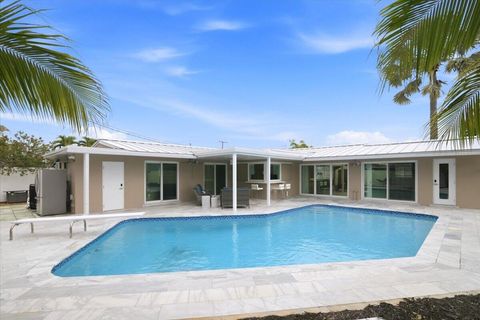 Photo of 1730 NW 39th Street, Oakland Park, FL 33309 (MLS # B26038316)