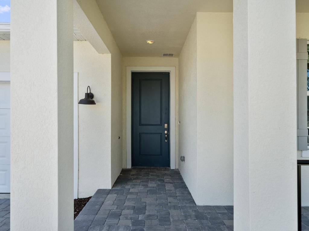 Photo of 6712 NW Cloverdale Avenue, Port Saint Lucie, FL 34987 (MLS # R10929395)