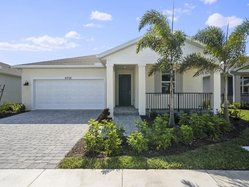 Photo of 6712 NW Cloverdale Avenue, Port Saint Lucie, FL 34987 (MLS # R10929395)