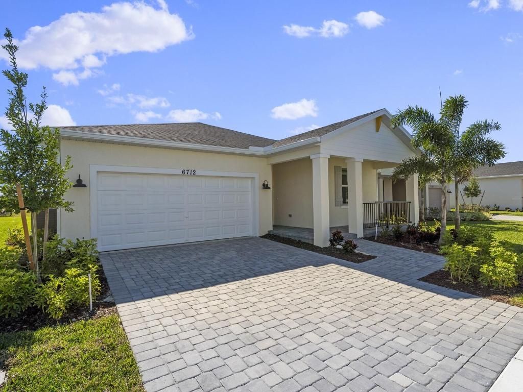 Photo of 6712 NW Cloverdale Avenue, Port Saint Lucie, FL 34987 (MLS # R10929395)
