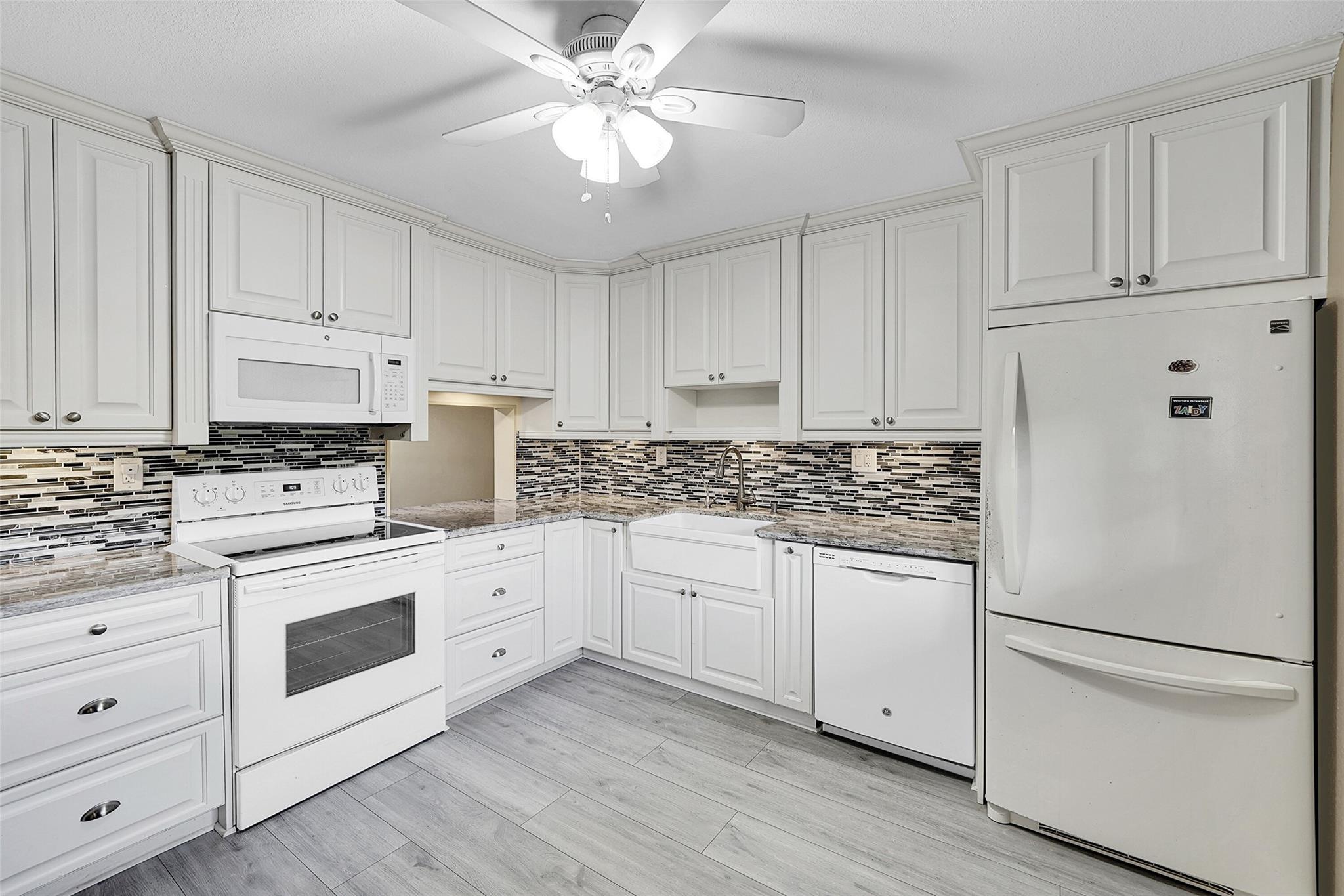 This stunning condo offers a custom kitchen, featuring elegant crown molding, a stylish decorative backsplash, granite countertops, and a charming farmhouse sink. Enjoy the seamless flow of durable vinyl flooring throughout the entire home, complemented by a fresh coat of paint that brightens every room. The master bathroom has been updated. Discover abundant storage with huge walk-in closets, and a massive utility room complete with a full washer and dryer for ultimate convenience. Relax and take in picturesque lake views from the expansive lanai.
Roof & Elevator are NEW and will be paid by the Seller. A/C is 2022.
The community has 2 Heated Pools, Fitness center, Tennis Courts, Shuffleboard, Sauna and Billiard Room. ""Association Requires 20% Down! 600 CREDIT SCORE. 40K INCOME""
