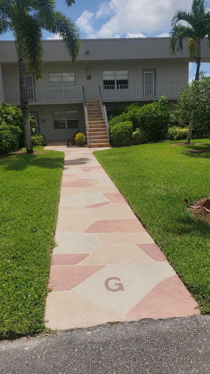 Golf & Water views!! Two bedroom, two full baths, 1st floor condo in desirable Kings Point community. Updated kitchen and baths, tile floors throughout. Spacious walk in closet in the master and full size washer & dryer.
