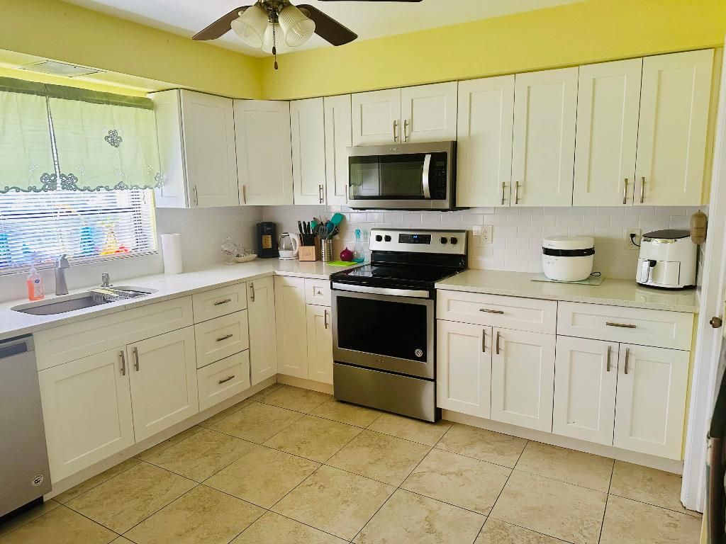 Photo of 4964 Eaglewood Road #A, Boynton Beach, FL 33436 (MLS # R11001248)