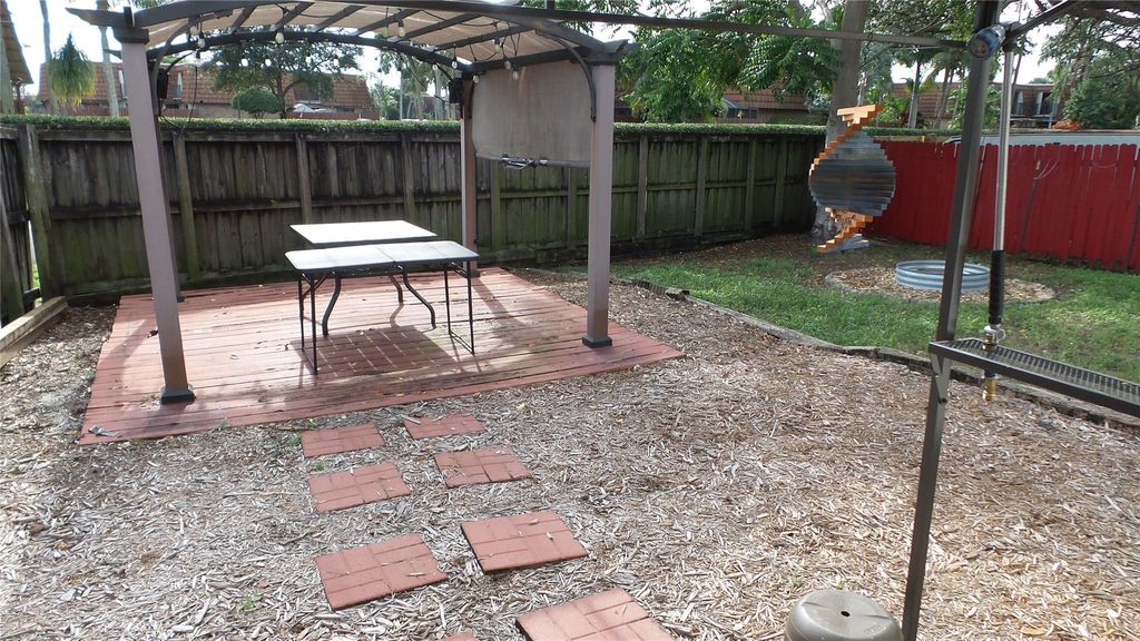 Photo of 1073 SW 119th Ave, Davie, FL 33325 (MLS # F10540886)