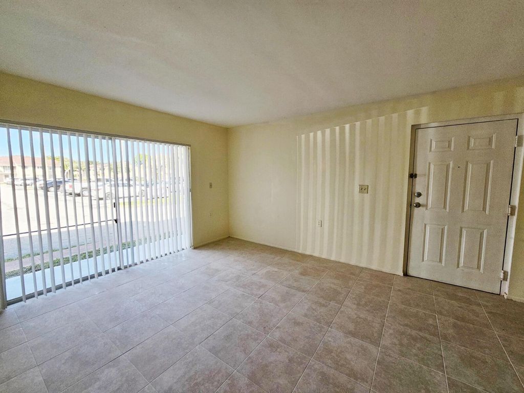 Photo of 1153 Lake Victoria Drive #D, Royal Palm Beach, FL 33411 (MLS # B26004459)