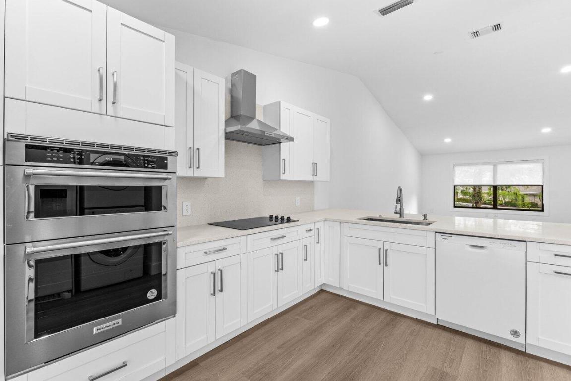 SHEFFIELD WOODS AT WELLINGTON CONDO - Residential