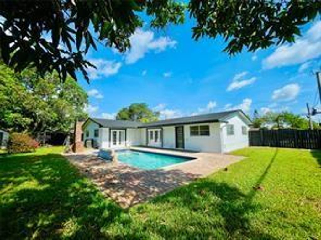 Photo of 1478 NE 56th St, Fort Lauderdale, FL 33334 (MLS # F10540943)