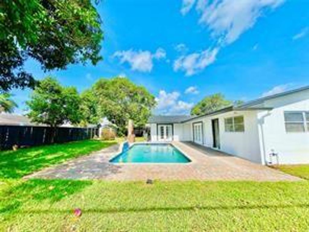 Photo of 1478 NE 56th St, Fort Lauderdale, FL 33334 (MLS # F10540943)