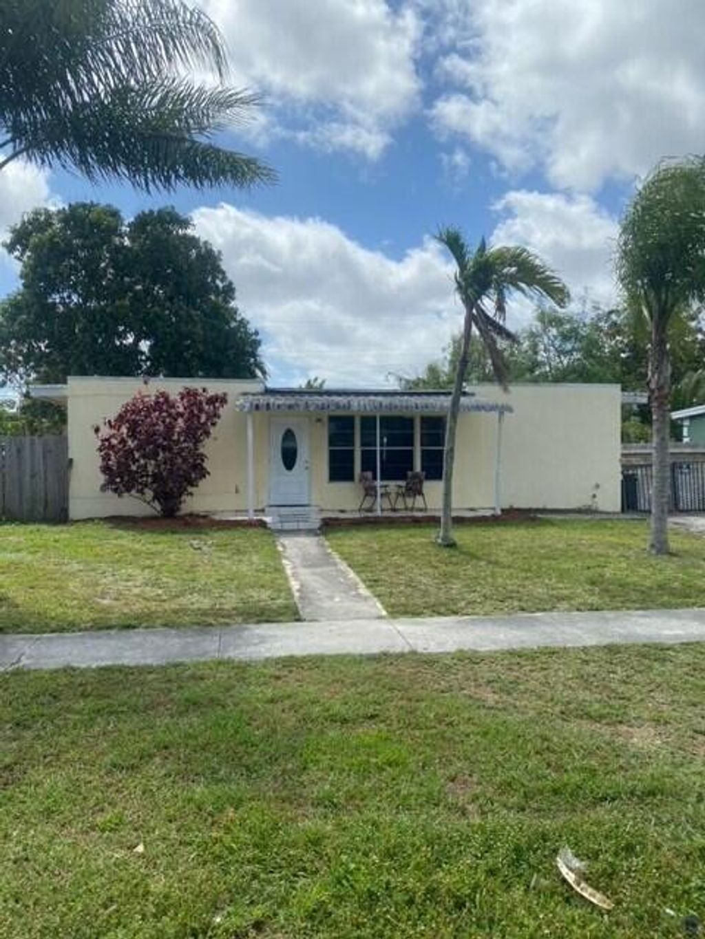 Photo of 3868 Nowata Road Rd, Lake Worth Beach, FL 33462 (MLS # R10785800)