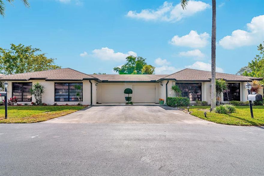 This lovely 55+ 2 bedroom 2 bathroom Villa is spacious and perfectly located in Boynton Beach! Step inside and be welcomed by open living spaces with tile throughout and new laminate flooring in both bedrooms. The kitchen boasts granite counter tops, dark cabinets and white appliances. Both bedrooms are spacious and feature walk-in closets! Walk out to the Florida room that overlooks the spacious backyard. Greentree Villas offers a variety of amenities with low HOA fees that covers Cable, Common Areas, Insurance-Bldg, Lawn Care, Maintenance-Exterior, Pest Control, Roof Maintenance, Sewer, Trash Removal & Water! This beautifully maintained community is located minutes from the beach, downtown West Palm Beach and Delray as well as multiple shopping and dining options!