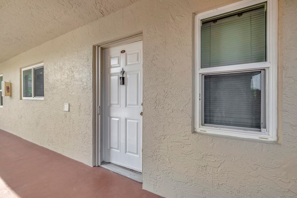 Photo of 2104 S Cypress Bend Drive #205, Pompano Beach, FL 33069 (MLS # R10965462)