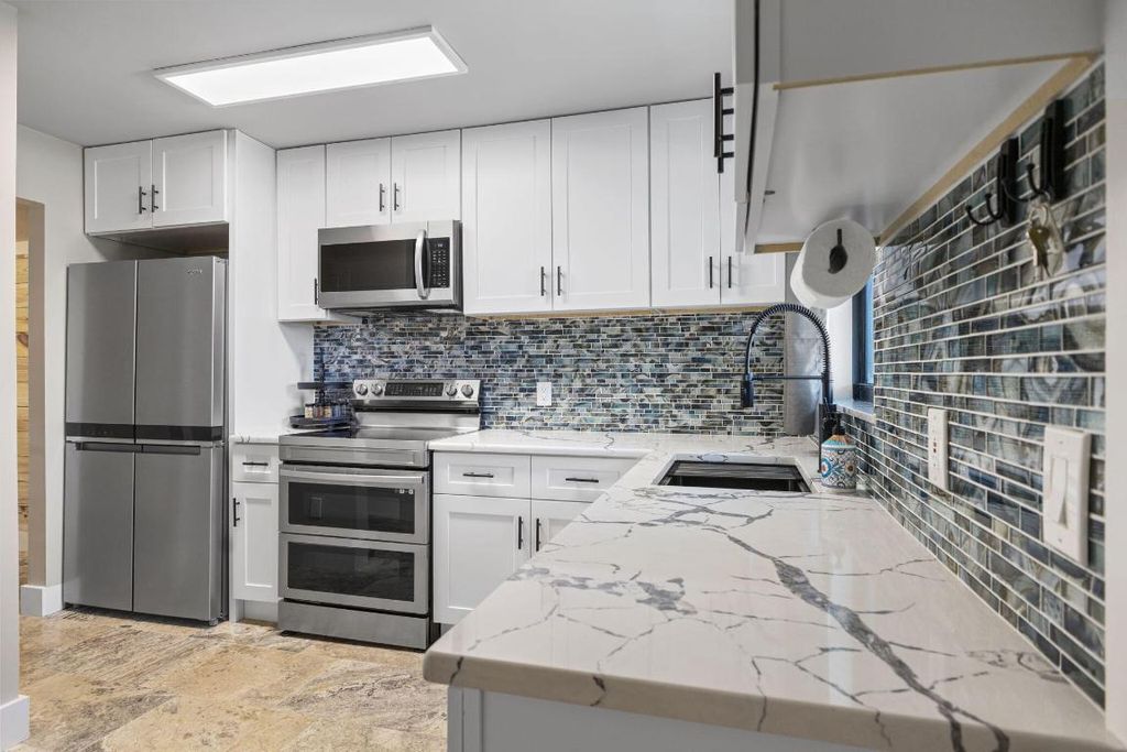 Photo of 1300 Seaway Drive #14, Fort Pierce, FL 34949 (MLS # R11101491)