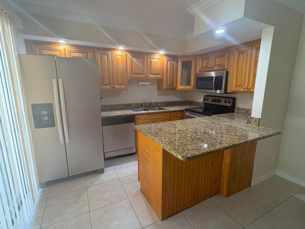 Photo of 234 Lake Arbor Drive, Palm Springs, FL 33461 (MLS # B26049752)