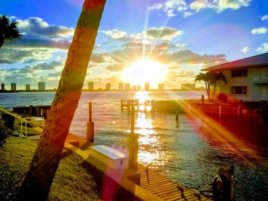 Water Lovers Paradise in a highly desirable, waterfront, well maintained community. This 2 bed/2 bath ground floor unit is a hidden gem in an active 55+ boating and fishing community in N. Palm Beach. If you are a boater, fisherman, or just enjoy relaxing water view with magical sunrises and sunset, this one is for you. Remodeled kitchen, baths, tile flooring, New AC handler & compressor, water filtration, ice maker, Corian countertops, hurricane shutters and more. Plus a 1 year home warranty included. Guest bedroom has Murphy Bed. You will love the intracoastal breezes off your patio. Boat slip lease is $2.00 per ft. Close and convenient to shops, restaurants, Manatee Lagoon, Kelsey Park, MacArthur sTate Park, NPB County Club, Peanut Island and so much more. Possible Seller Financing.