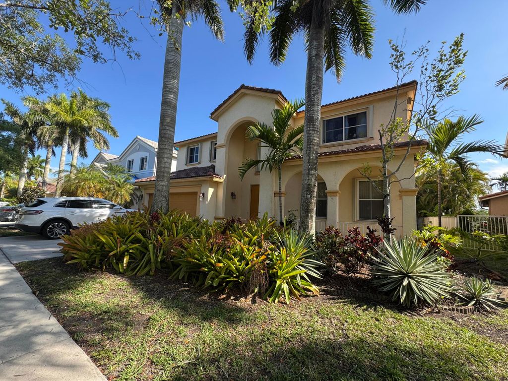 Photo of 898 Tulip Circle, Weston, FL 33327 (MLS # B26023454)