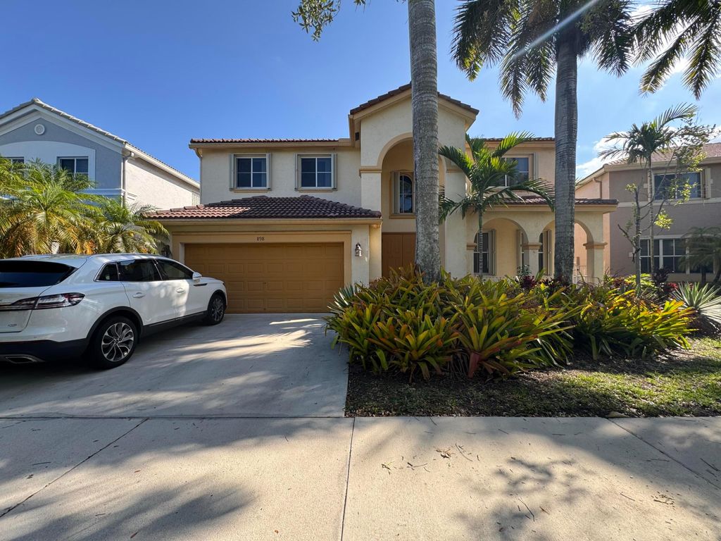 Photo of 898 Tulip Circle, Weston, FL 33327 (MLS # B26023454)
