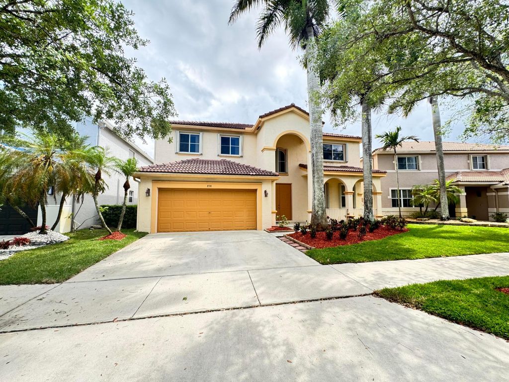 Photo of 898 Tulip Circle, Weston, FL 33327 (MLS # B26023454)