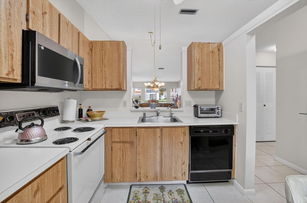 Photo of 8697 Sunbird Place, Boca Raton, FL 33496 (MLS # B26024410)