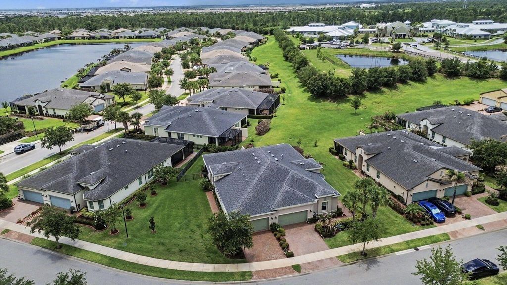 Photo of 12773 SW Lake Fern Circle, Port Saint Lucie, FL 34987 (MLS # B26029393)
