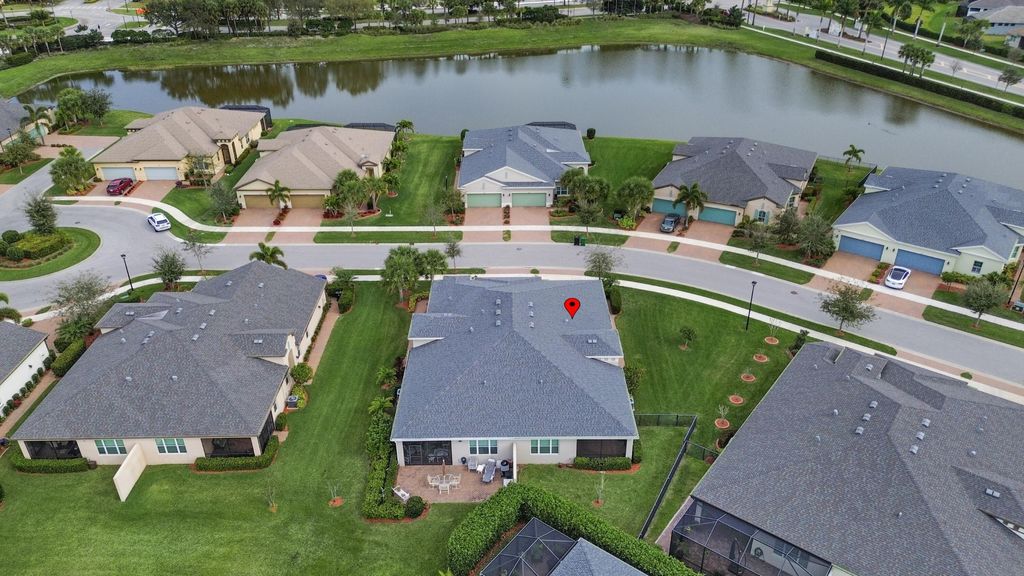 Photo of 12773 SW Lake Fern Circle, Port Saint Lucie, FL 34987 (MLS # B26029393)