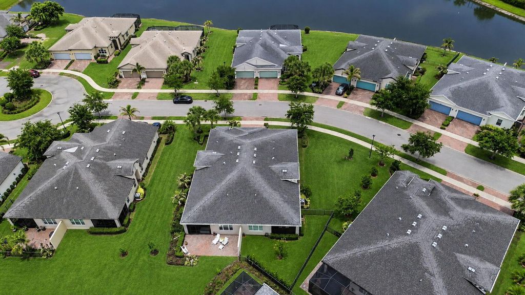 Photo of 12773 SW Lake Fern Circle, Port Saint Lucie, FL 34987 (MLS # B26029393)