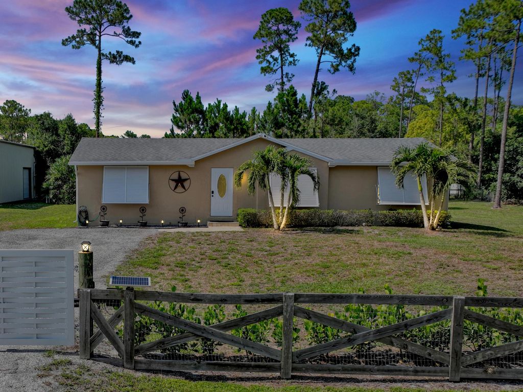 Photo of 15437 76th Road N, The Acreage, FL 33470 (MLS # R10992932)