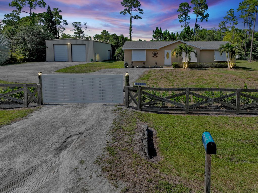 Photo of 15437 76th Road N, The Acreage, FL 33470 (MLS # R10992932)