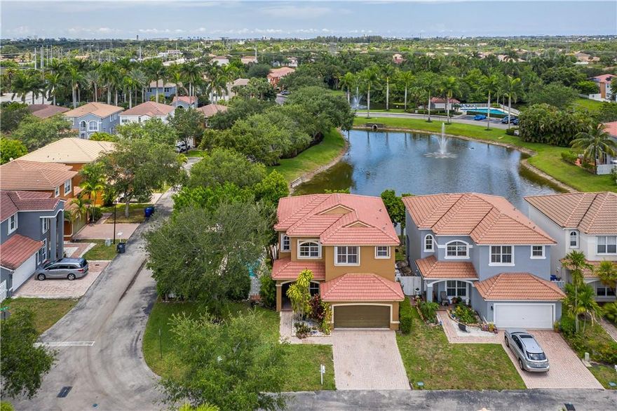 Welcome to the best Maple Ridge has to offer!  This exceptional home features a huge corner double lot, beautiful pool area overlooking the lake for entertaining guests and a nice size screened in patio!  Home features 3beds/2.5baths + loft + bonus room and accordion shutters! Mapleridge is centrally located in South Florida with easy access to highways, airport and walking distance to houses of worship. Super pet-friendly community with a dog park just a short walk away and a nice community pool and kids park! Extremely well-maintained community with very low HOA and is 24 hour guard gated! This home will not last! Welcome to the best Maple Ridge has to offer!  This exceptional home features a huge corner double lot, beautiful pool area overlooking the lake for entertaining guests and a nice size screened in patio!  Home features 3beds/2.5baths + loft + bonus room and accordion shutters! Mapleridge is centrally located in South Florida with easy access to highways, airport and walking distance to houses of worship. Super pet-friendly community with a dog park just a short walk away and a nice community pool and kids park! Extremely well-maintained community with very low HOA and is 24 hour guard gated! This home will not last!