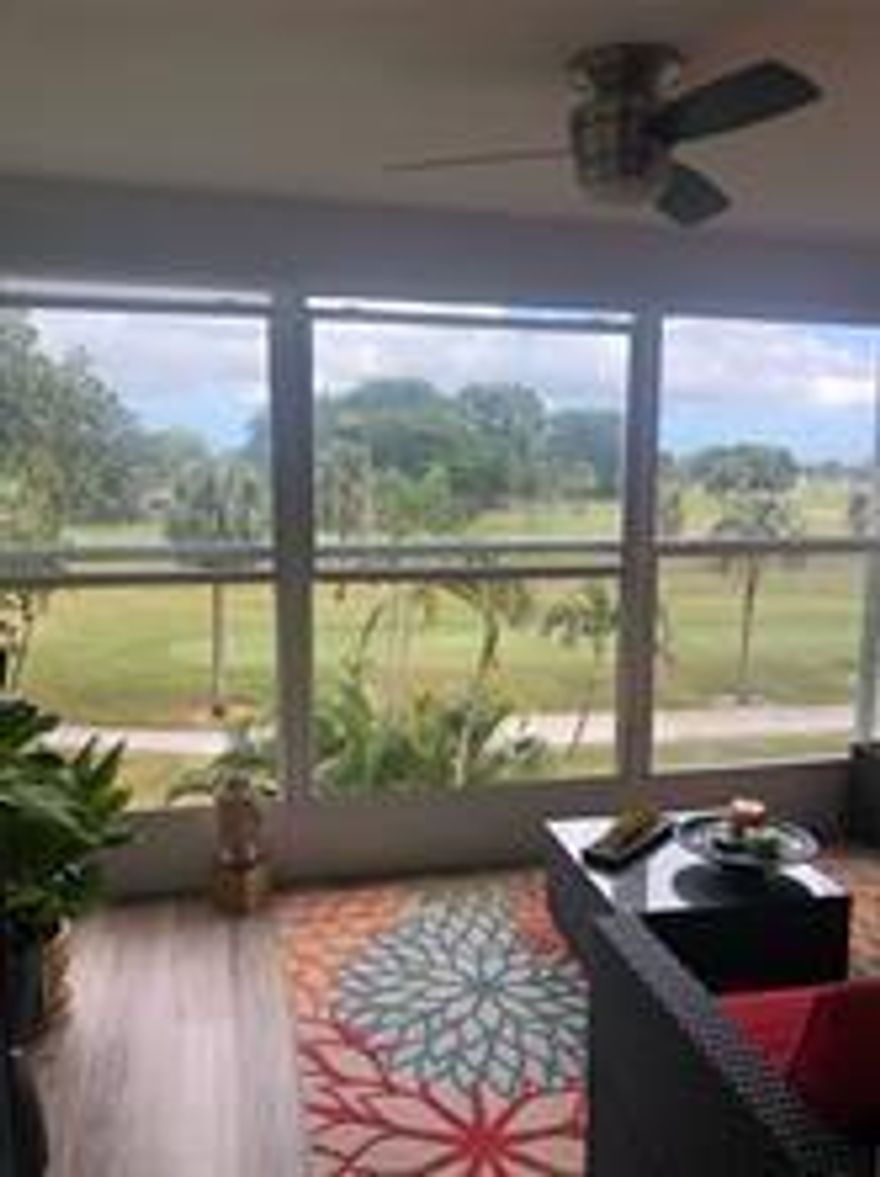 NEW impact windows and a stunning golf course view! This lovingly cared-for and fully renovated 2BD/2BA condo in the peaceful 55+ community of Palm Springs 2 offers true comfort and pride of ownership. Features include an open-concept kitchen with stainless steel appliances, new washer/dryer, vinyl floors, walk-in closet, and an enclosed balcony overlooking the greens.  Community amenities include heated pools, sauna, fitness center, library, clubhouse, billiards, ping-pong, shuffleboard, BBQ area, and golf course access. 1 assigned parking + guest spaces, extra storage, and water & cable included. Furniture negotiable. Move-in ready—don’t miss this opportunity for low-maintenance living in a vibrant active-adult community!"
