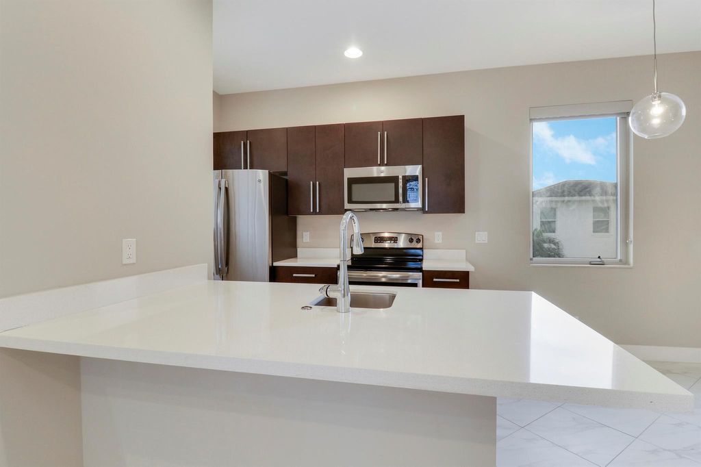 Photo of 5029 Grandiflora Road, Palm Beach Gardens, FL 33418 (MLS # R11101128)