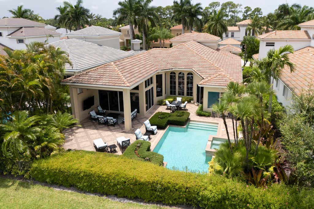Photo of 118 MONTE CARLO Drive, Palm Beach Gardens, FL 33418 (MLS # B26063500)