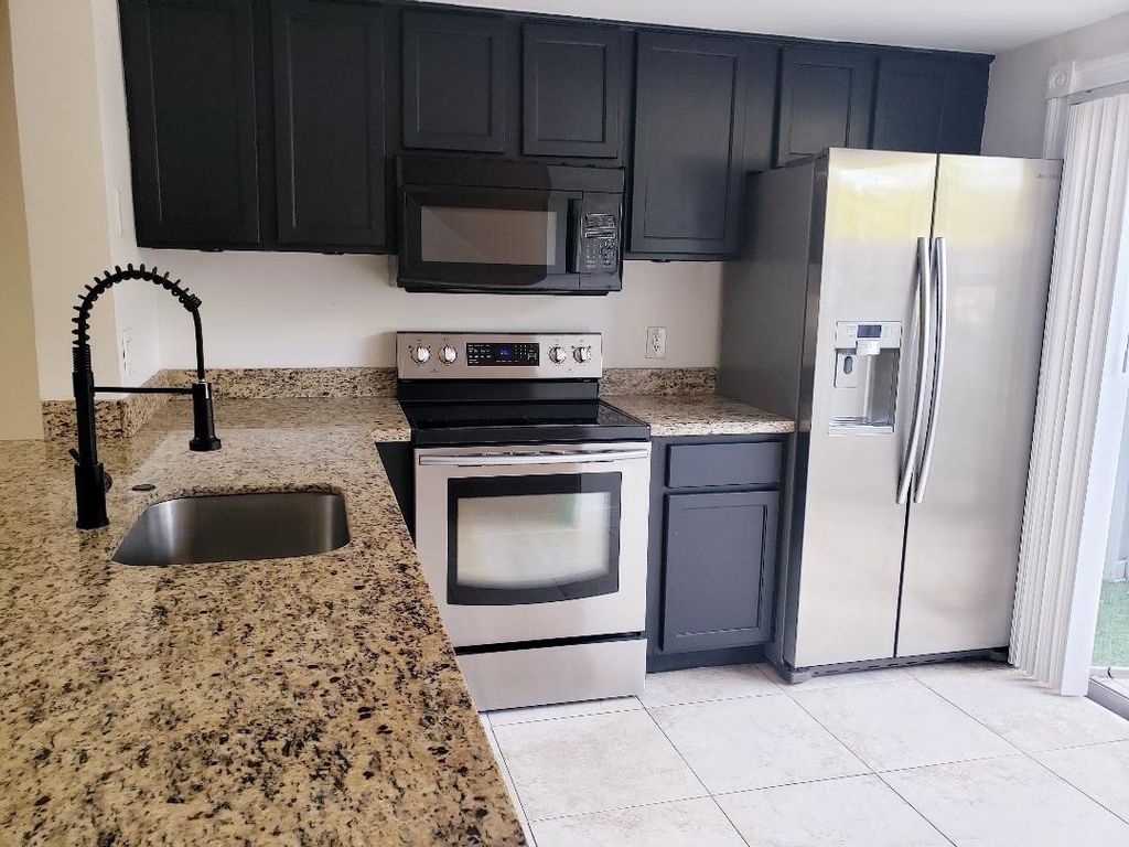 Photo of 89 SW 3rd Street, Pompano Beach, FL 33060 (MLS # F10554206)