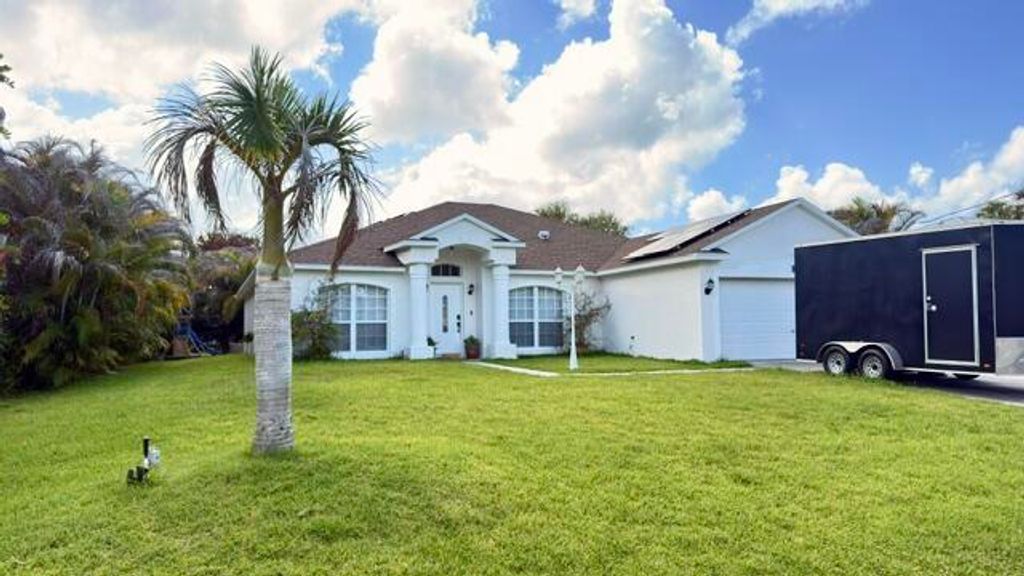 Photo of 2326 SW Antiquera Street, Port Saint Lucie, FL 34953 (MLS # B26033672)